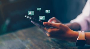 Phone displays social media notifications.