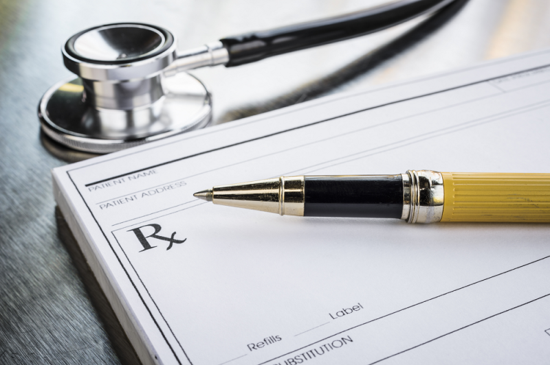 Rx prescription pad with pen, stethoscope