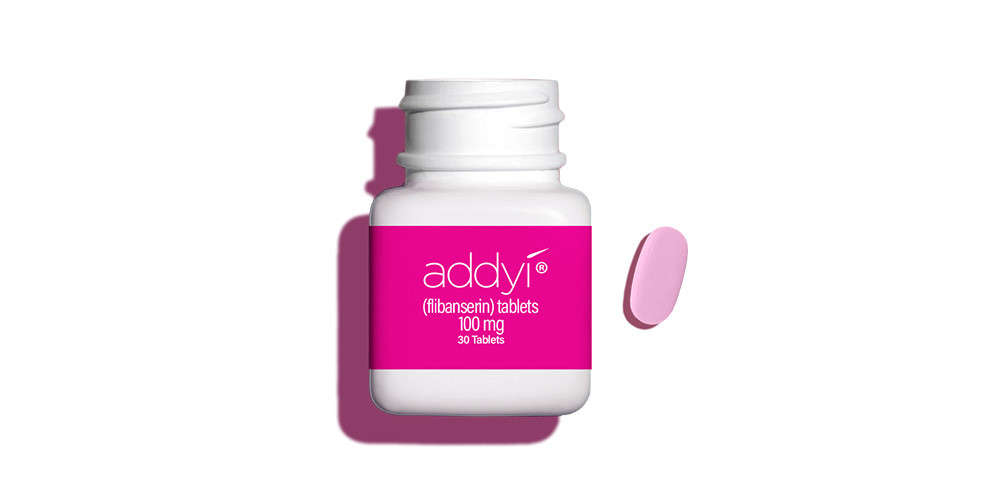 Addyi (flibanserin) bottle and 100mg tablet, from maker Sprout Pharmaceuticals