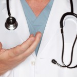 Male Doctor Hand Abstract with Lab Coat and Stethoscope. Male Doctor Hand Abstract with Lab Coat and Stethoscope.