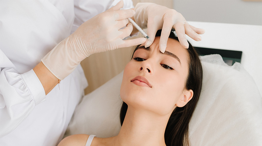 amspa-botox-injection-forehead-lines-062326 Botox injected into woman's glabellar lines